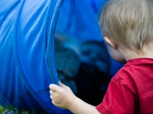 The tunnel rolled down the hill with the 4 year old inside. Danny had to see what was going on.